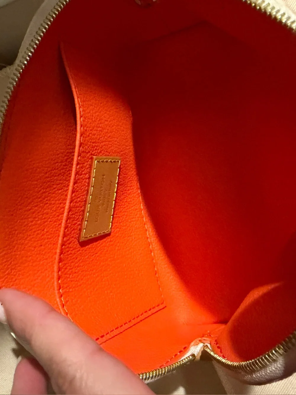 Louis Vuitton Cream Cosmetic Pouch with Pink & Orange Monogram.